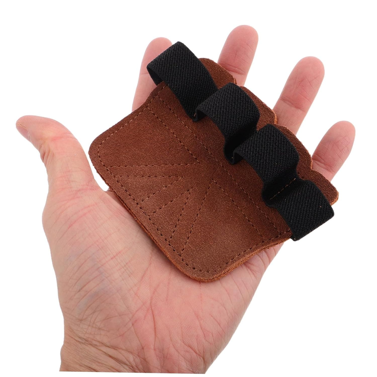 Close-up of a brown RAWGRIP suede lifting pad worn on an open hand, showing the black finger loops